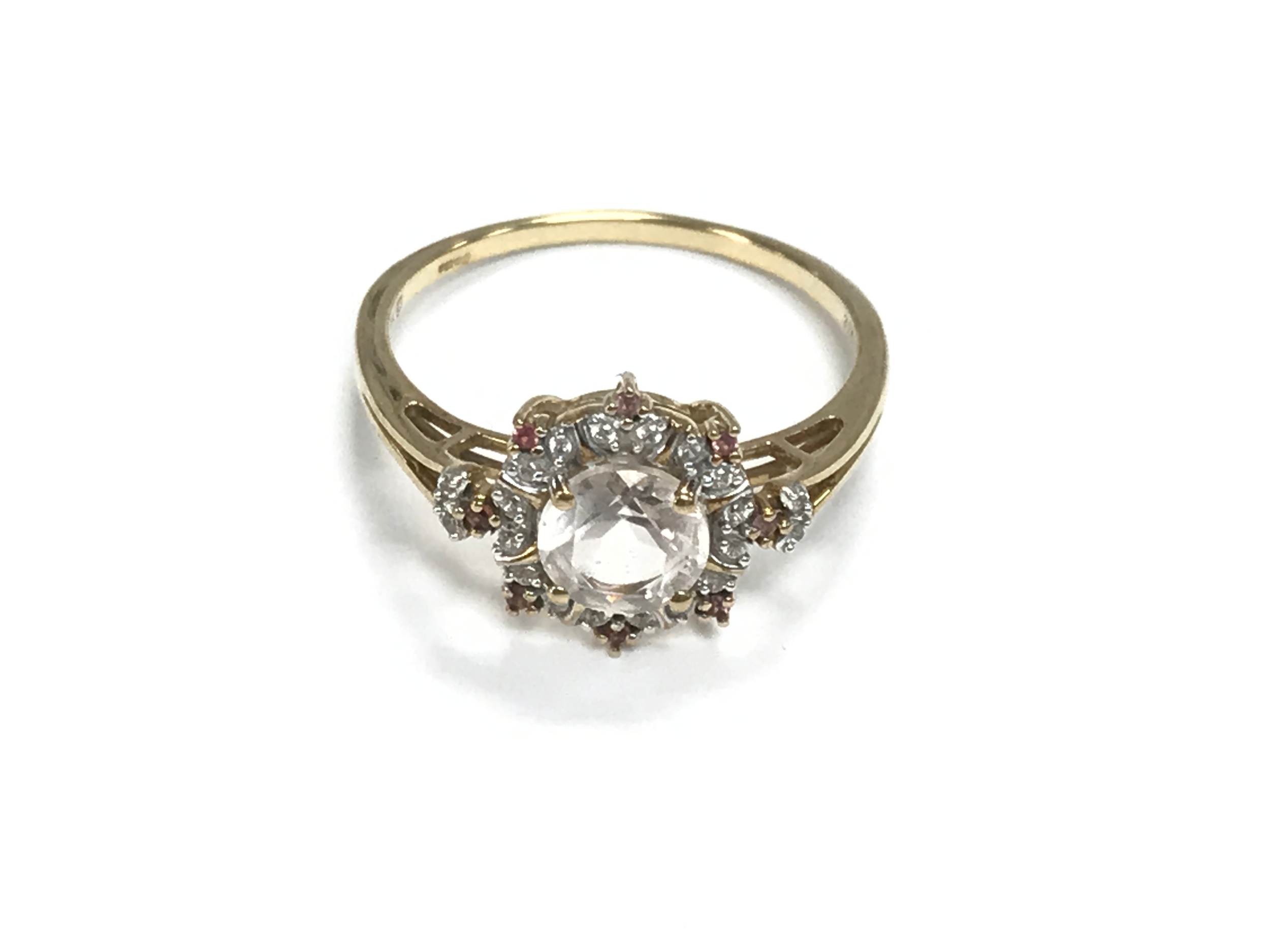 A 9ct yellow gold ring set with white stones and small pink stones. Size S and 2.5g