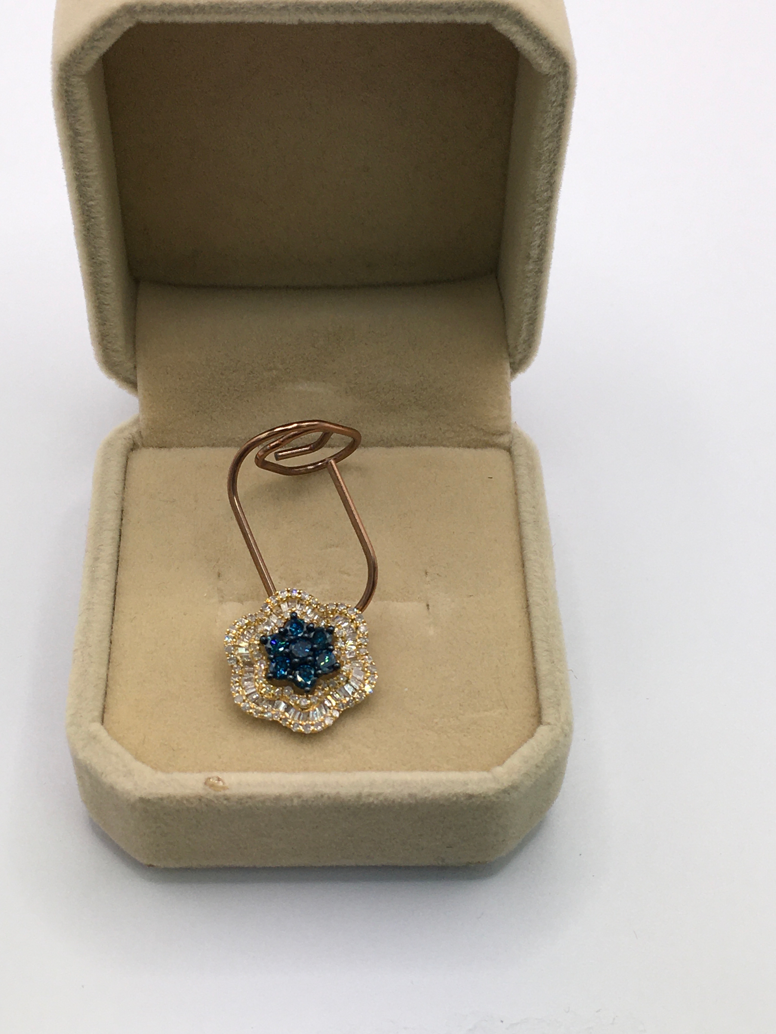 18k yellow gold and natural blue diamond flower pendant. 1.00ct. 1.5cm long excluding fitting. Boxed with cert.