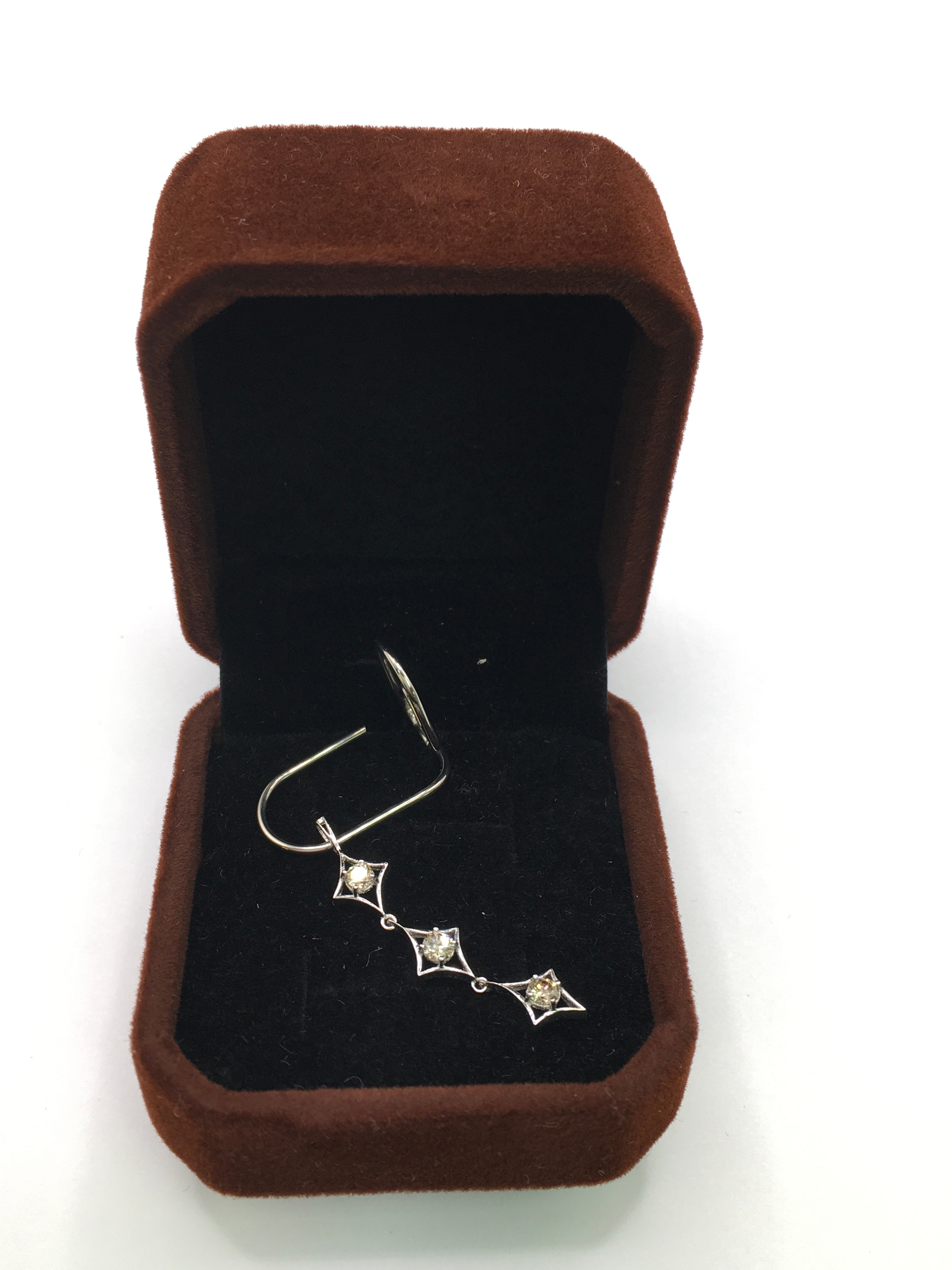 18k white gold and natural diamond set, triple drop pendant. 0.30ct. Approx 3cm long excluding fitting. Boxed with cert.