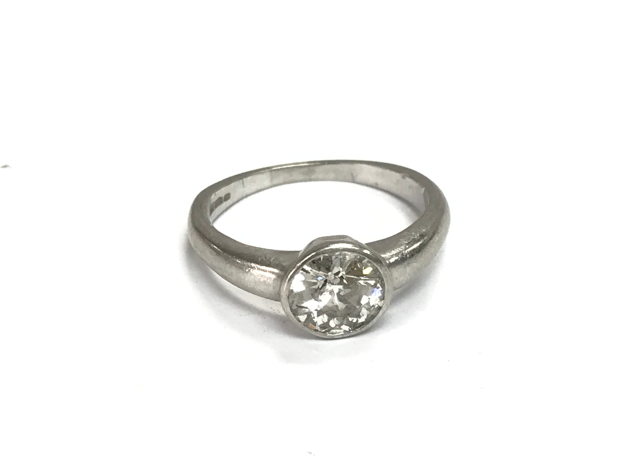 A platinum diamond solitaire ring. Stone approximately 1ct ring size L and 4.4g