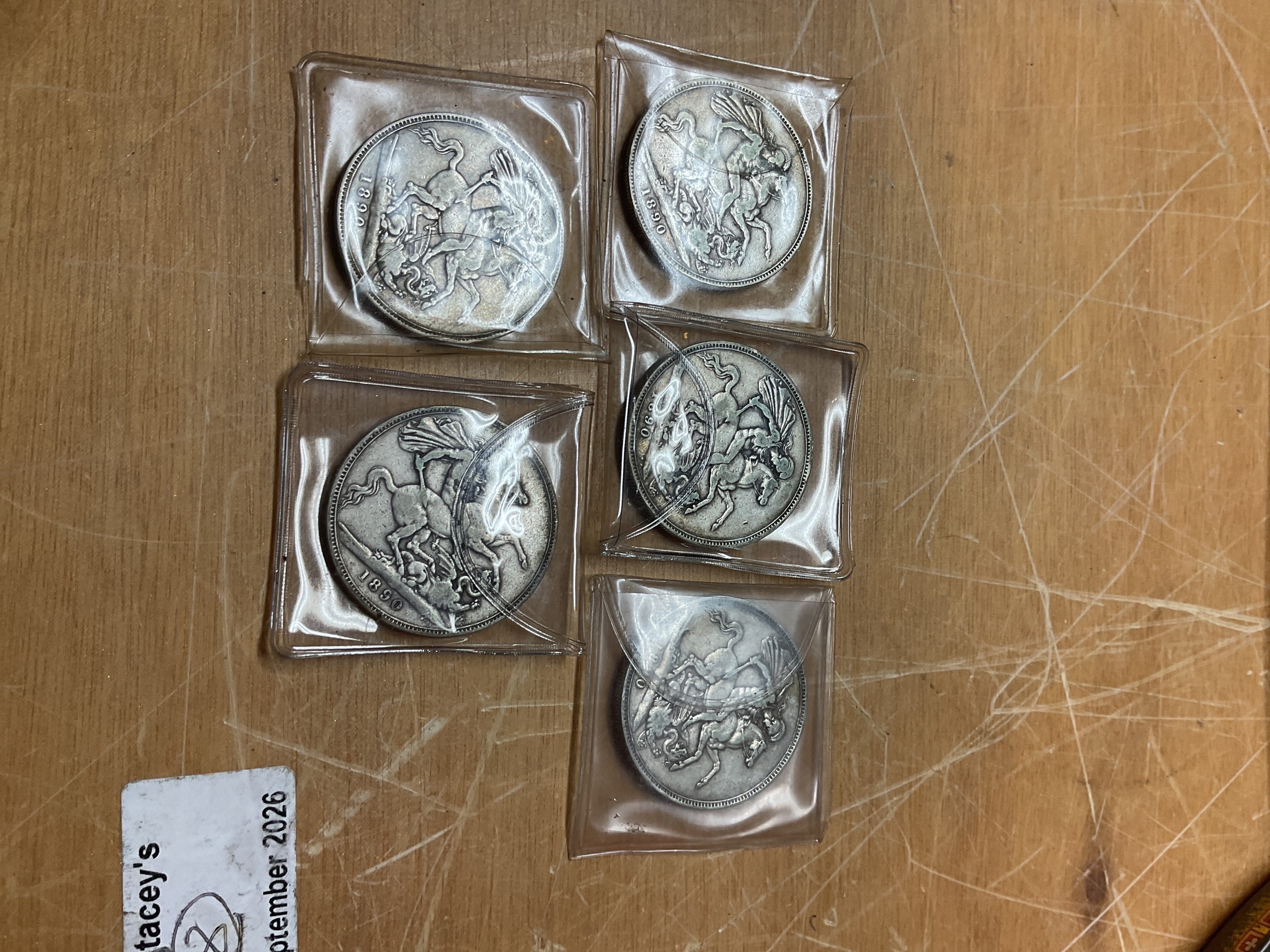 Five 1890 crowns.