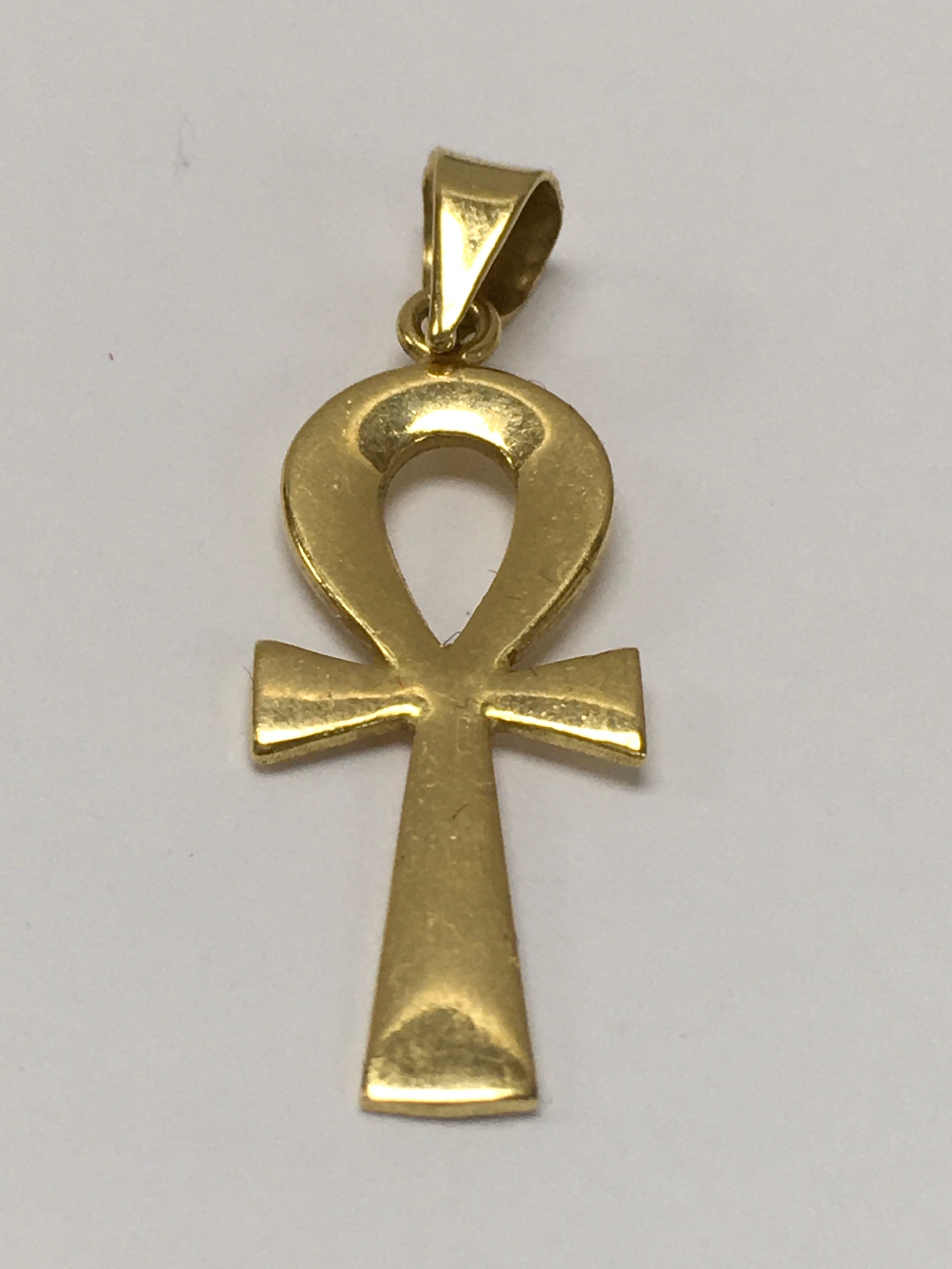 A yellow gold, possible Egyptian pendant cross of potential high grade. Approx: 3.5cm long.