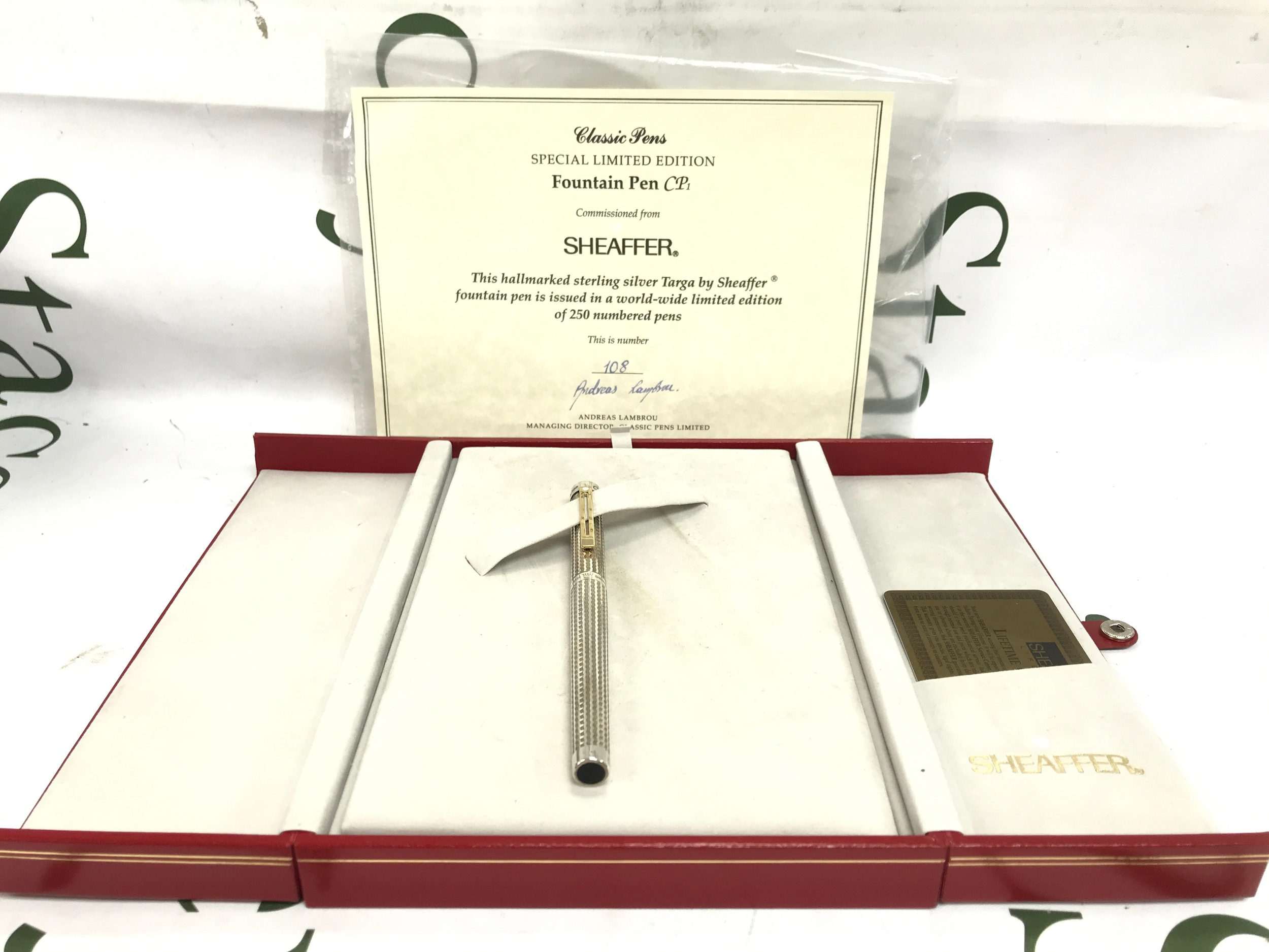 A boxed Sheaffer silver limited edition pen 108/250