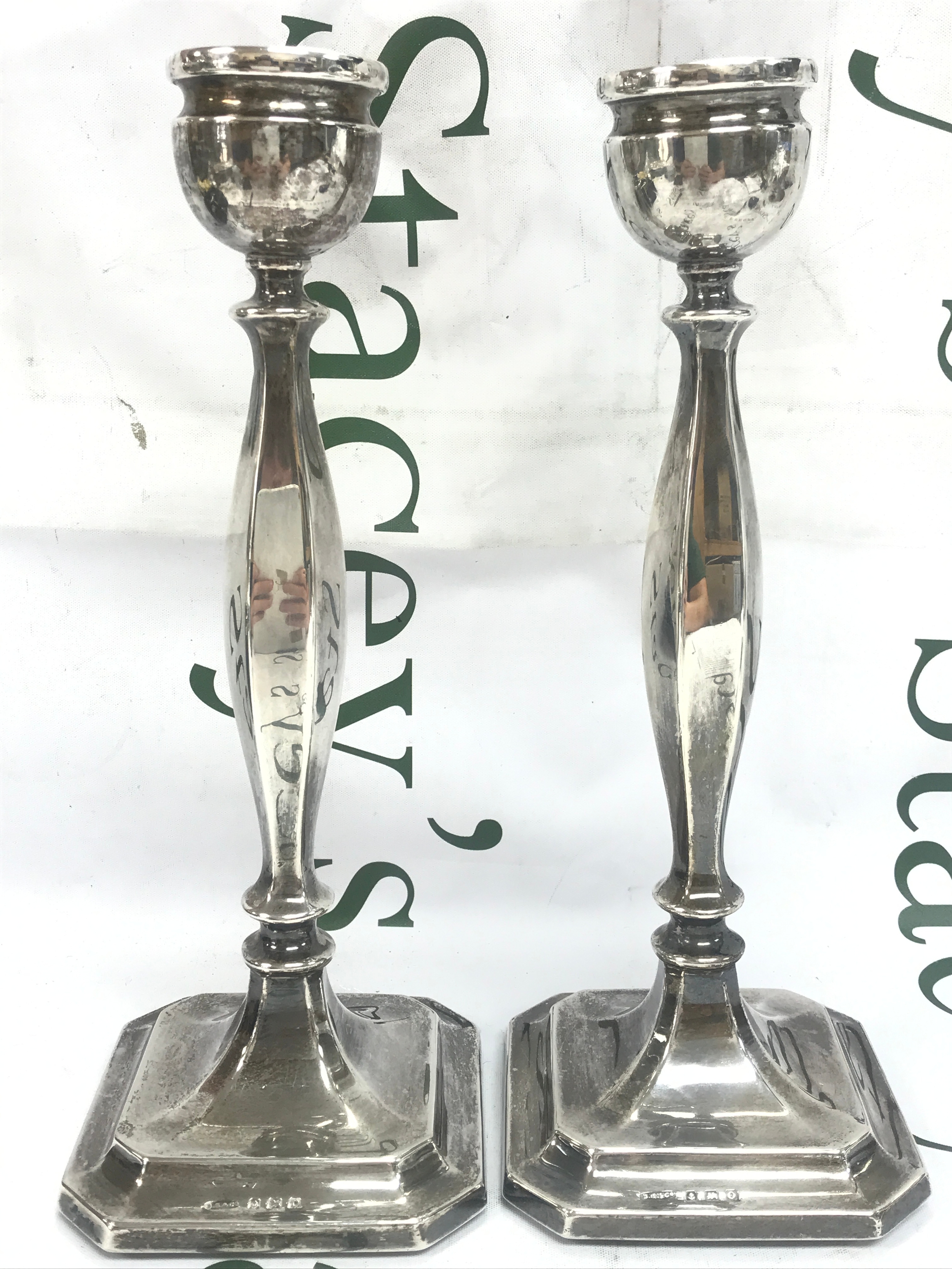 A pair of silver candlesticks, 27cm tall. Birmingham 1913. 835g total weight
