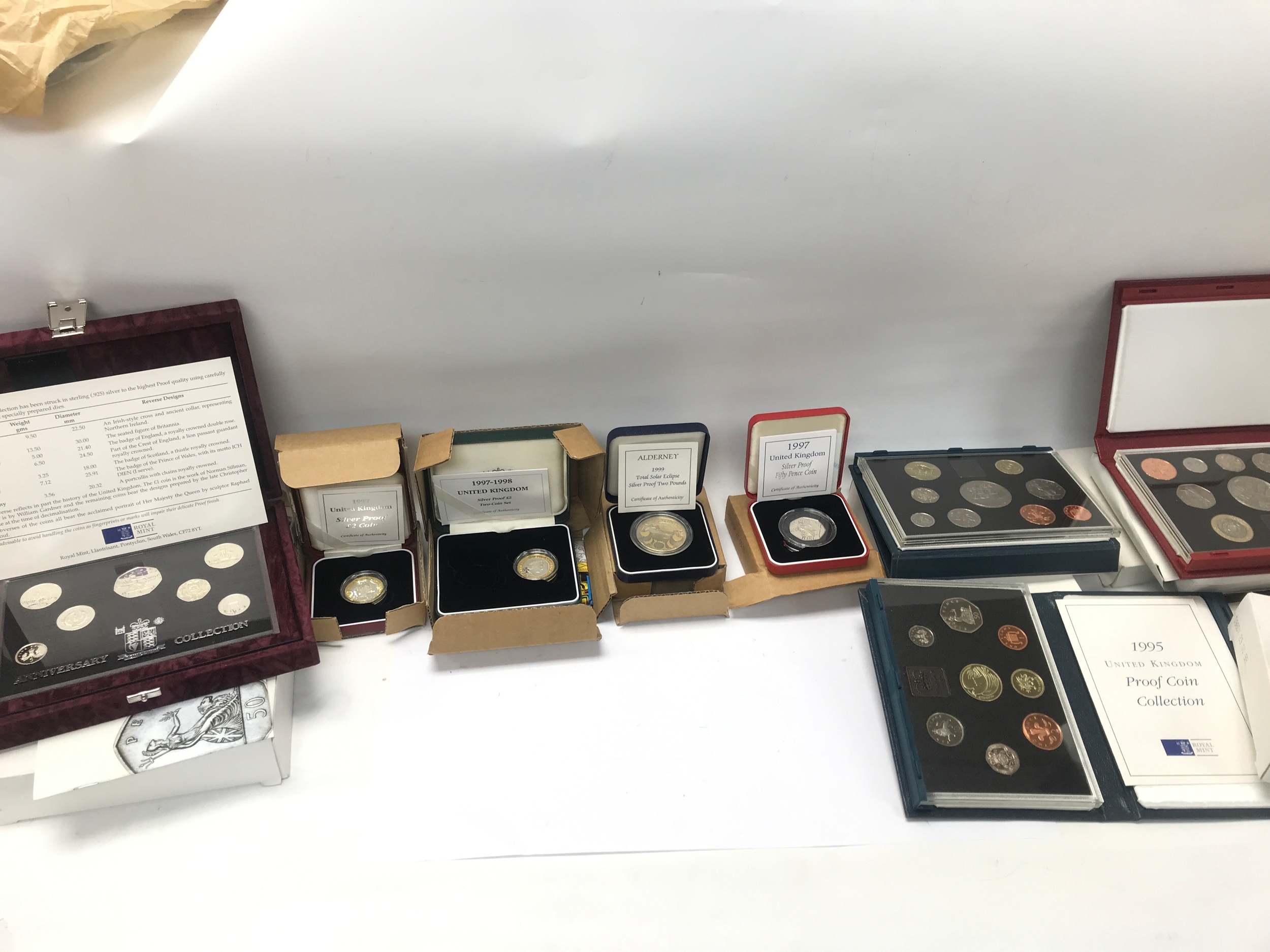 A Collection of assorted proof coins and sets including a number of silver proof examples.