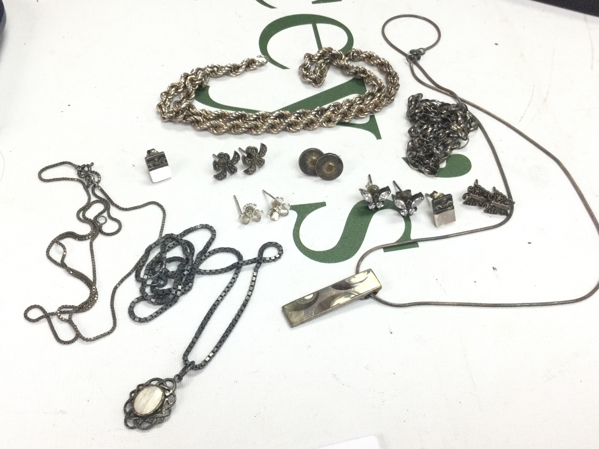 A collection of silver Jewellery including necklaces, earrings etc . 46.7g total weight