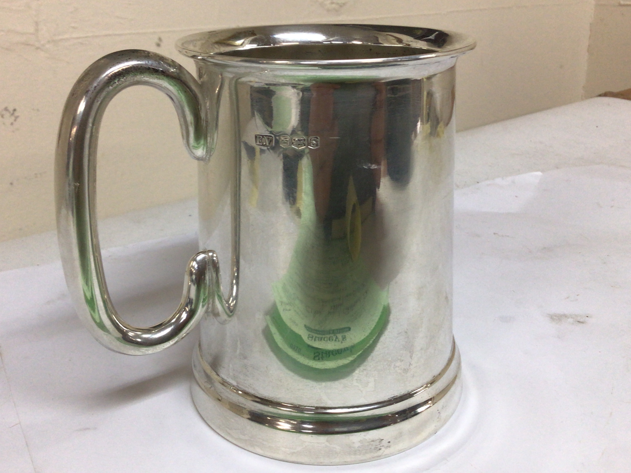 A Silver tankard Sheffield hallmarks the tankard with a glass base Total weight 485g 