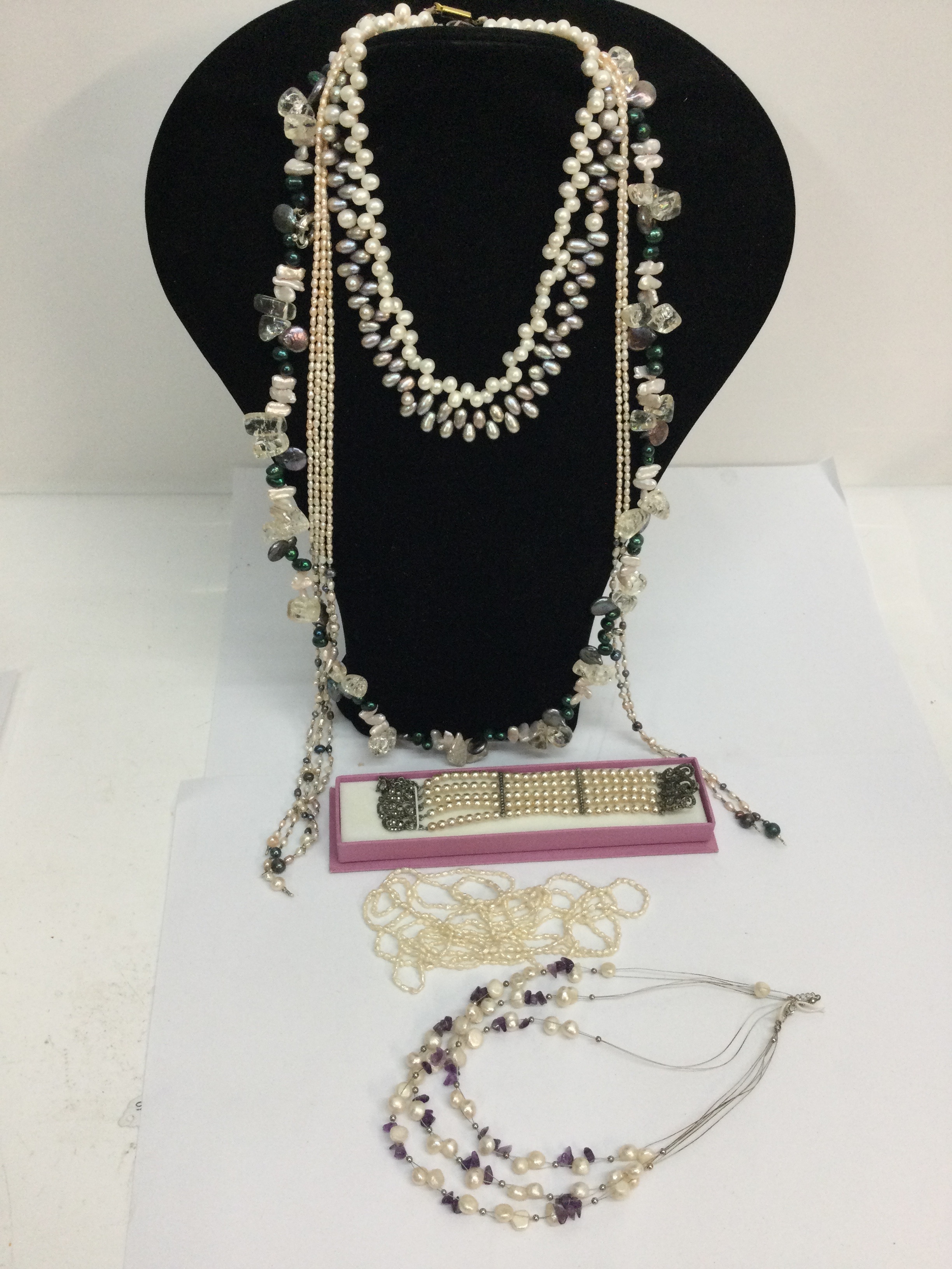 A cultured, coloured pearl choker necklace with silver clasp, two other examples, plus seed pearl and simulated jewellery