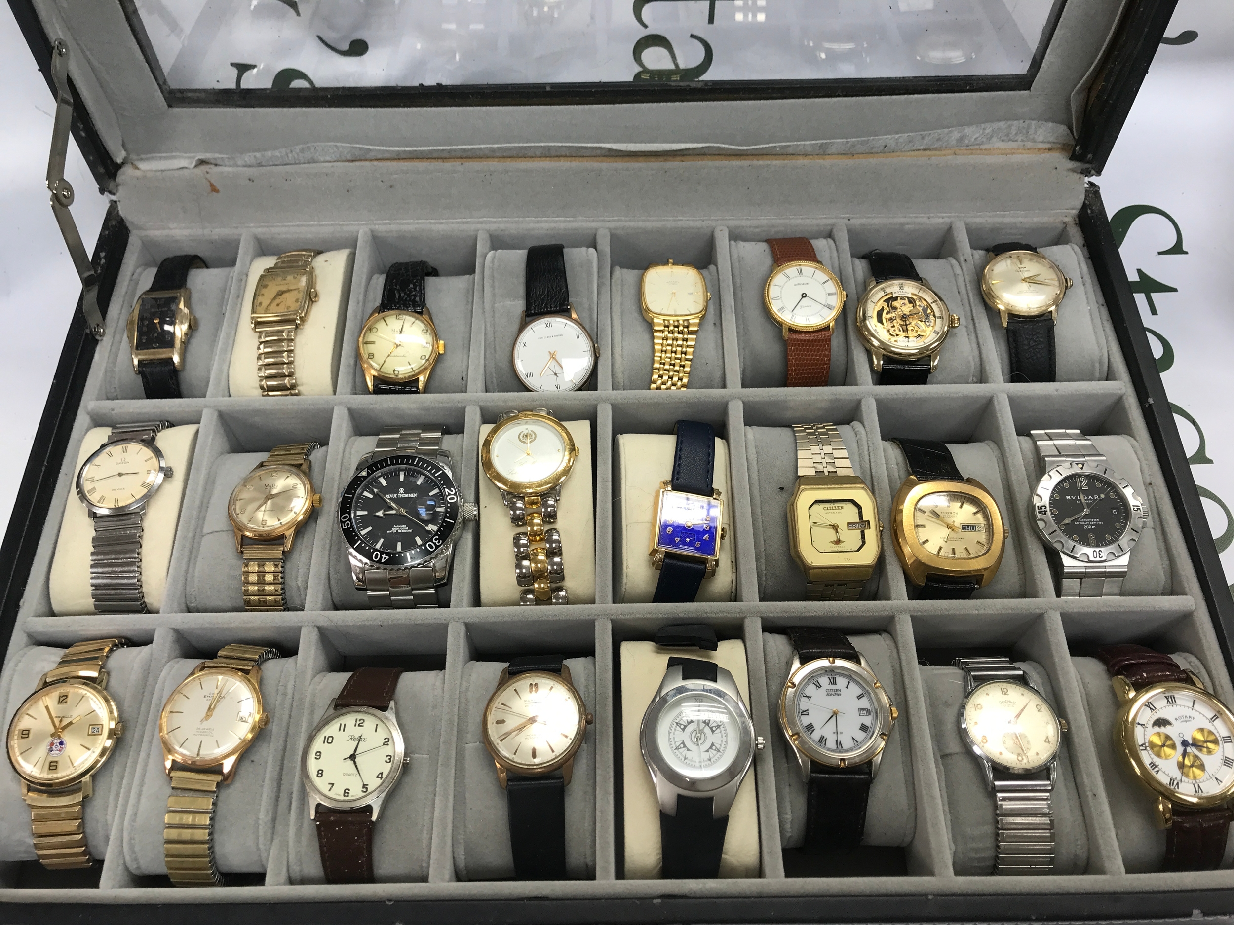 A collect of vintage and replica watches including Roamer, rotary etc
