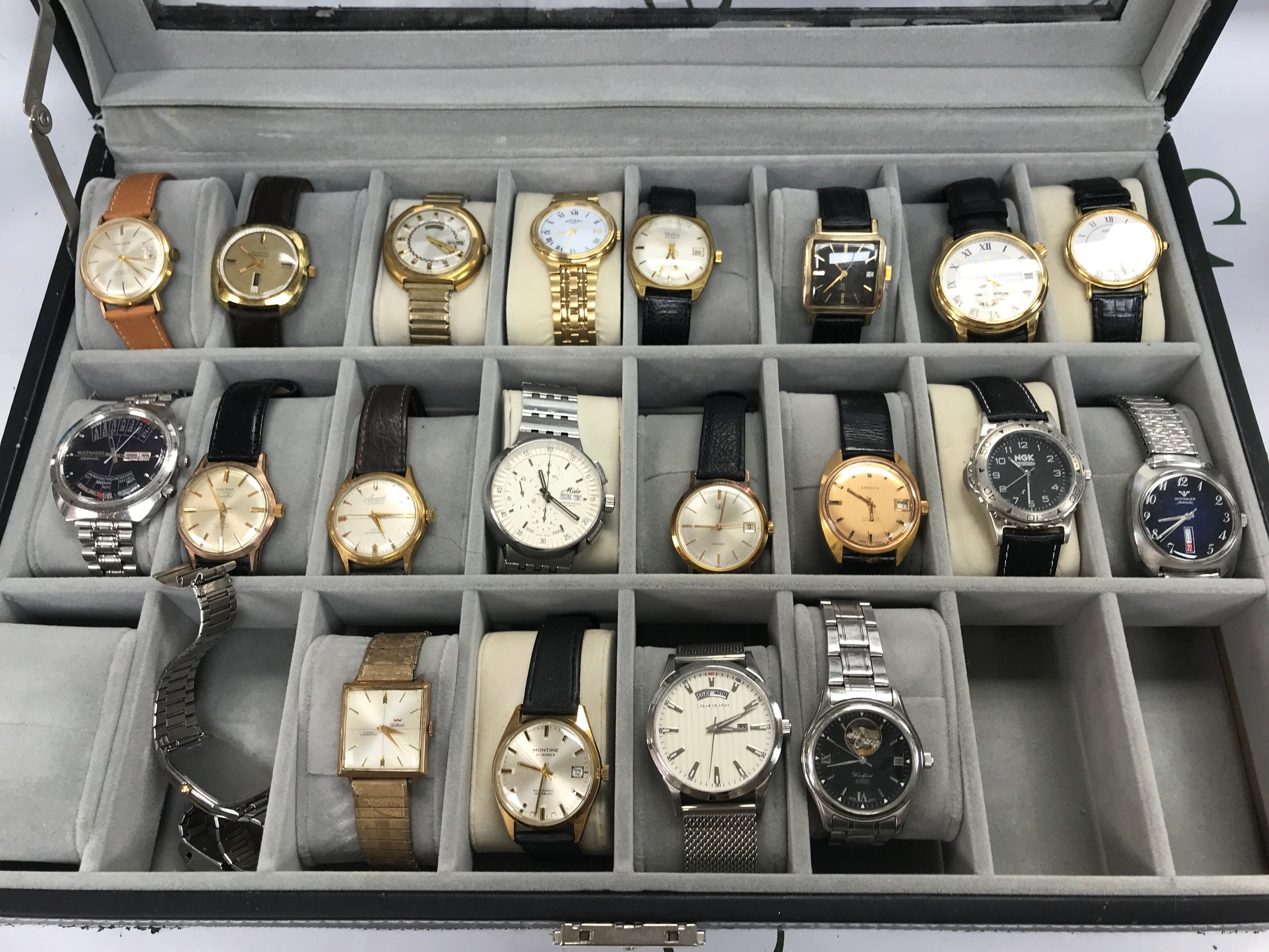 A large collection of assorted vintage watches including Rotary etc