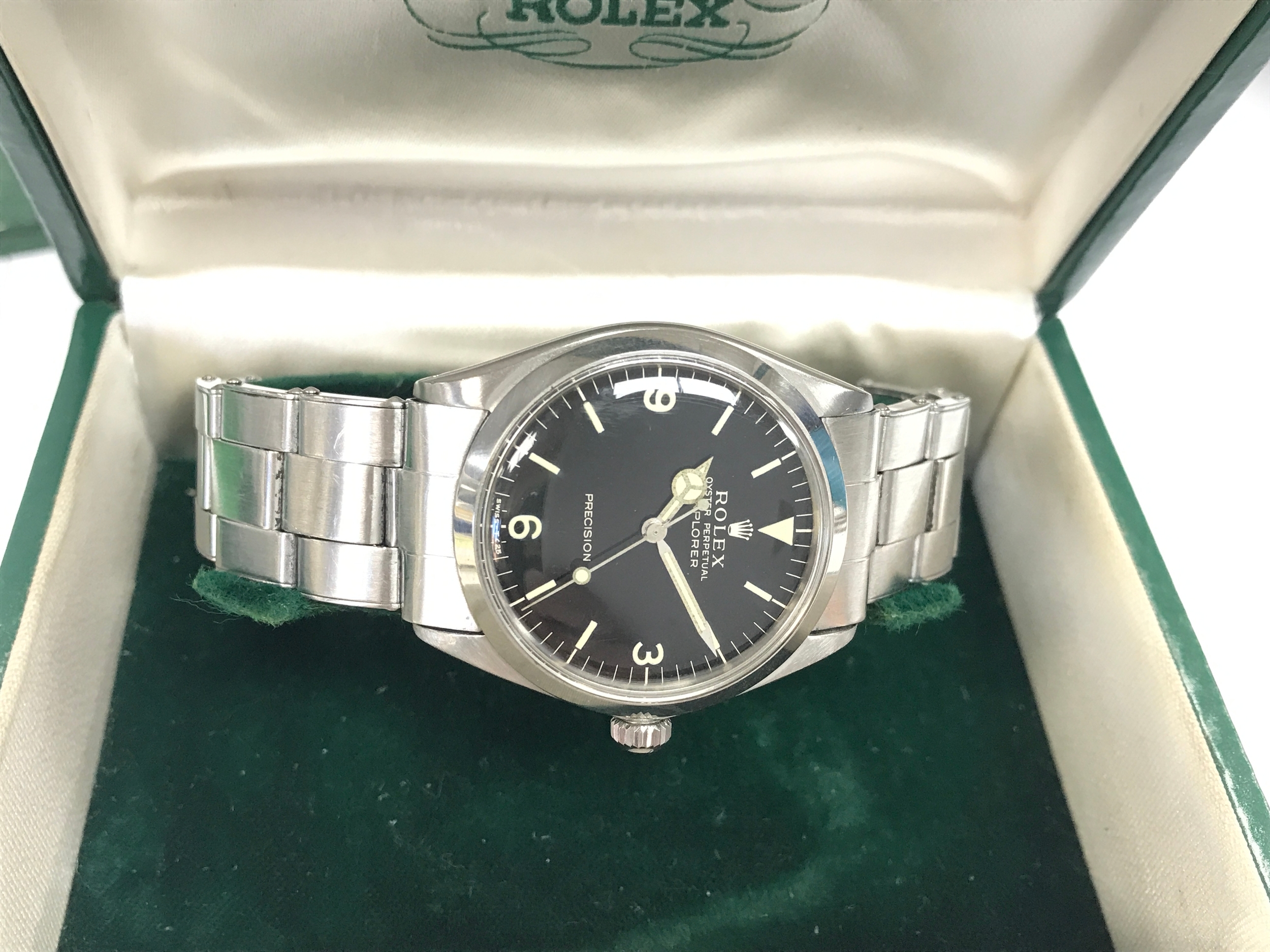 Vintage Rolex Explorer Ref. 5500 featuring a distinctive black dial with iconic 3-6-9 Arabic numerals. Comes complete with box, guarantee and service book and vintage 1978 service boxes. Winds and runs. Lovely age to hands.