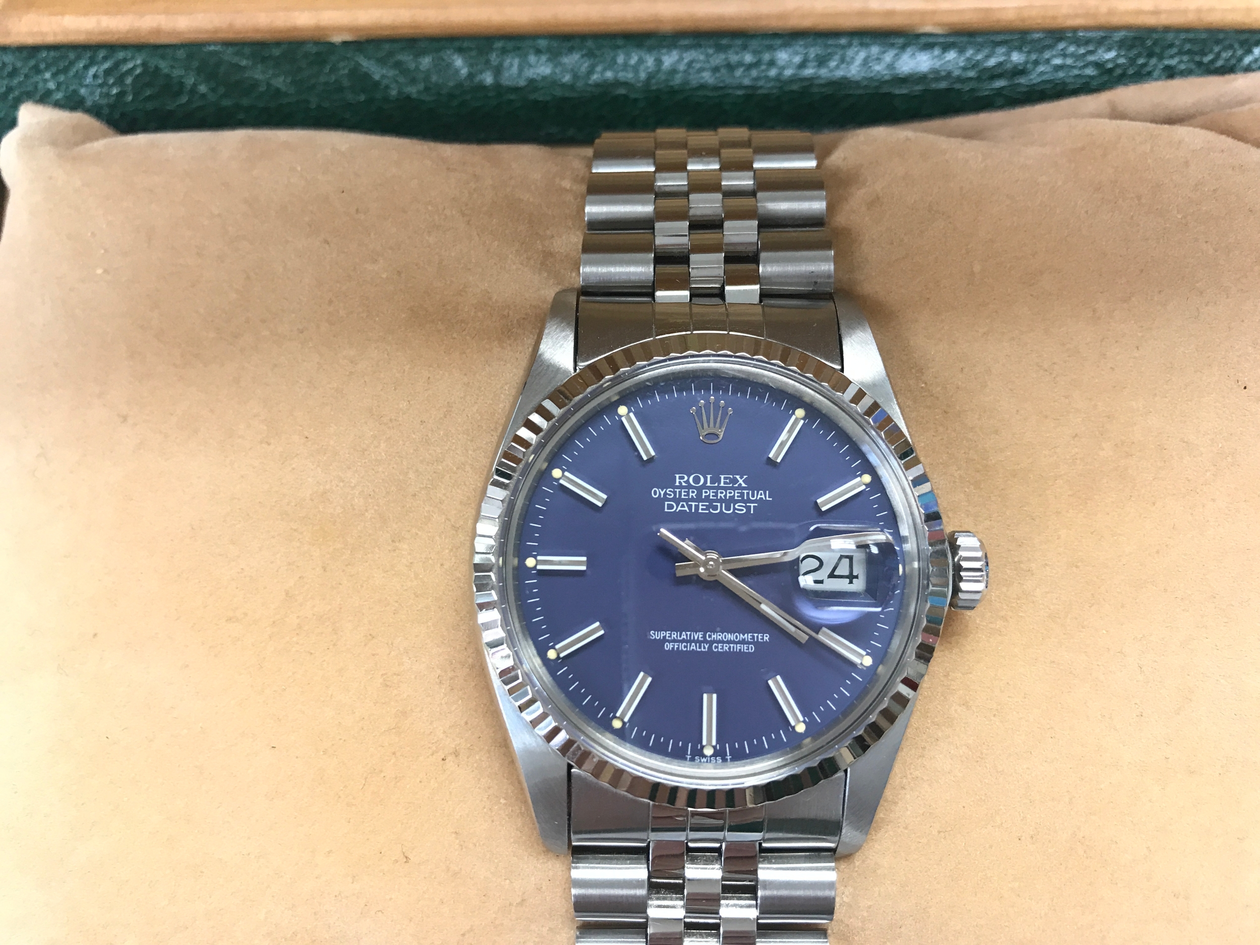 Rolex Oyster Perpetual Datejust 36mm blue dial, fluted bezel, and a Jubilee bracelet. Box, winds and runs. 