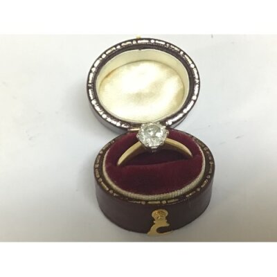 An 18carat yellow gold ring set with a diamond solitaire approximately 1.9carat with gemologist report