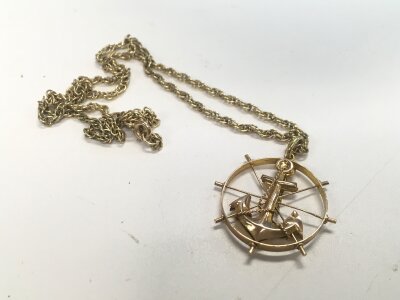 A 9ct gold prince of wales chain with an anchor pendant. Approx weight 7.56 grams.