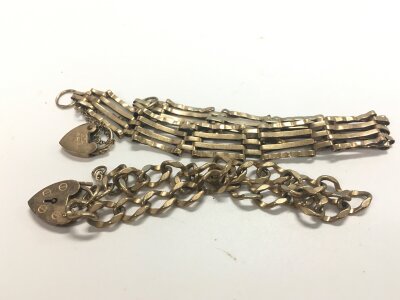 Two 9ct gold heart lock bracelets. Approx weight 14.31 grams.