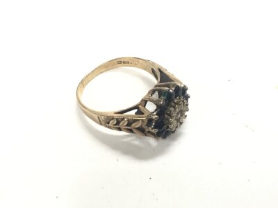 A 9ct gold sapphire set cluster, approx weight 5 grams, size S.