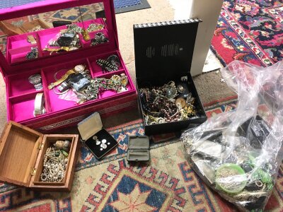 a box of mixed costume jewellery