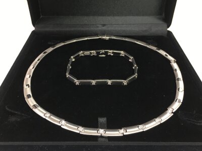 An Italian 14k white gold bracelet and necklace set with diamonds, necklace length approx 36cm. Total weight approx 63.5g.