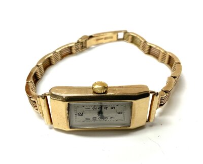 A 9ct gold ladies watch, case marked Dennison. Overall weight. 18.5g (without movement 13g)