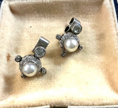 a pair of art deco seeds pearl and diamond stud earrings