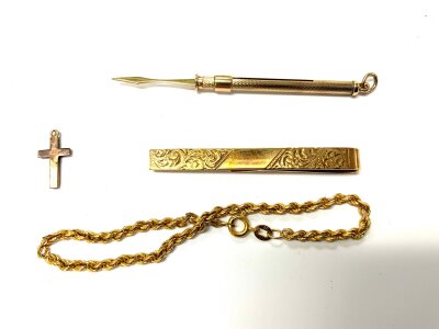 A small collection of gold articles… 9ct tie clip, 9ct gold bracelet, 9ct toothpick, tinyt 9ct cross charm.  9.6g