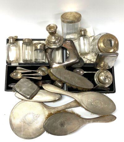 A collection of hallmarked silver mounted articles.  Bonhams.