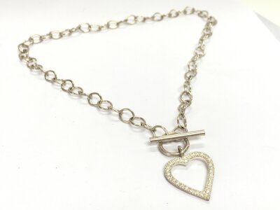 A hallmarked 925 heart diamonte with bar clasp chain in box. 18.4g