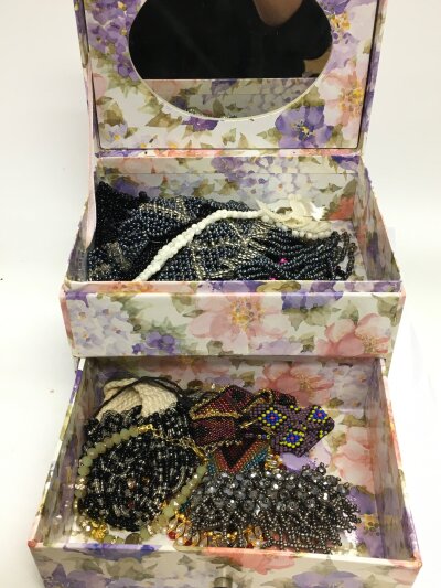 A box of beaded jewellery- necklaces and bracelets