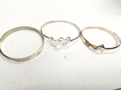 Three 925 stamped ladies bangles, approx weight 43.2 grams.