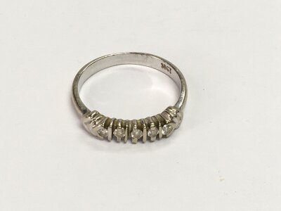 An 18ct white gold ring set with small diamonds, approx 2.3g and approx size M-N.