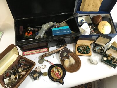 A collection of costume jewellery including watches, brooches, cufflinks