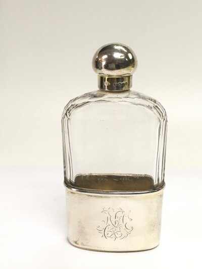 A Victorian glass and silver hip flask, London hallmarks, approx height 14.5cm.