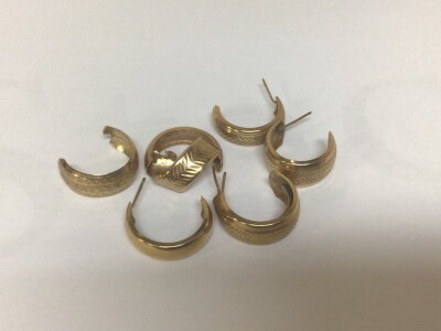 A Collection of unmarked yellow metal earrings. Weight 4.7g