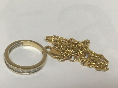 A 9carat gold half hoop eternity ring and a 9carat gold bracelet chain 5grams (2)