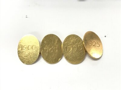 A pair of 18ct gold cufflinks engraved 1900 - 1925 with original case. 8.98g