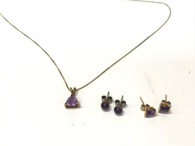 9ct gold amethyst pendant chain and  studs along with garnet studs.
3.50g