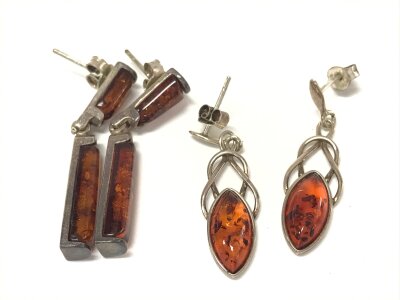 Two pairs of amber earrings.
