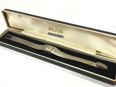 An Avia silver watch