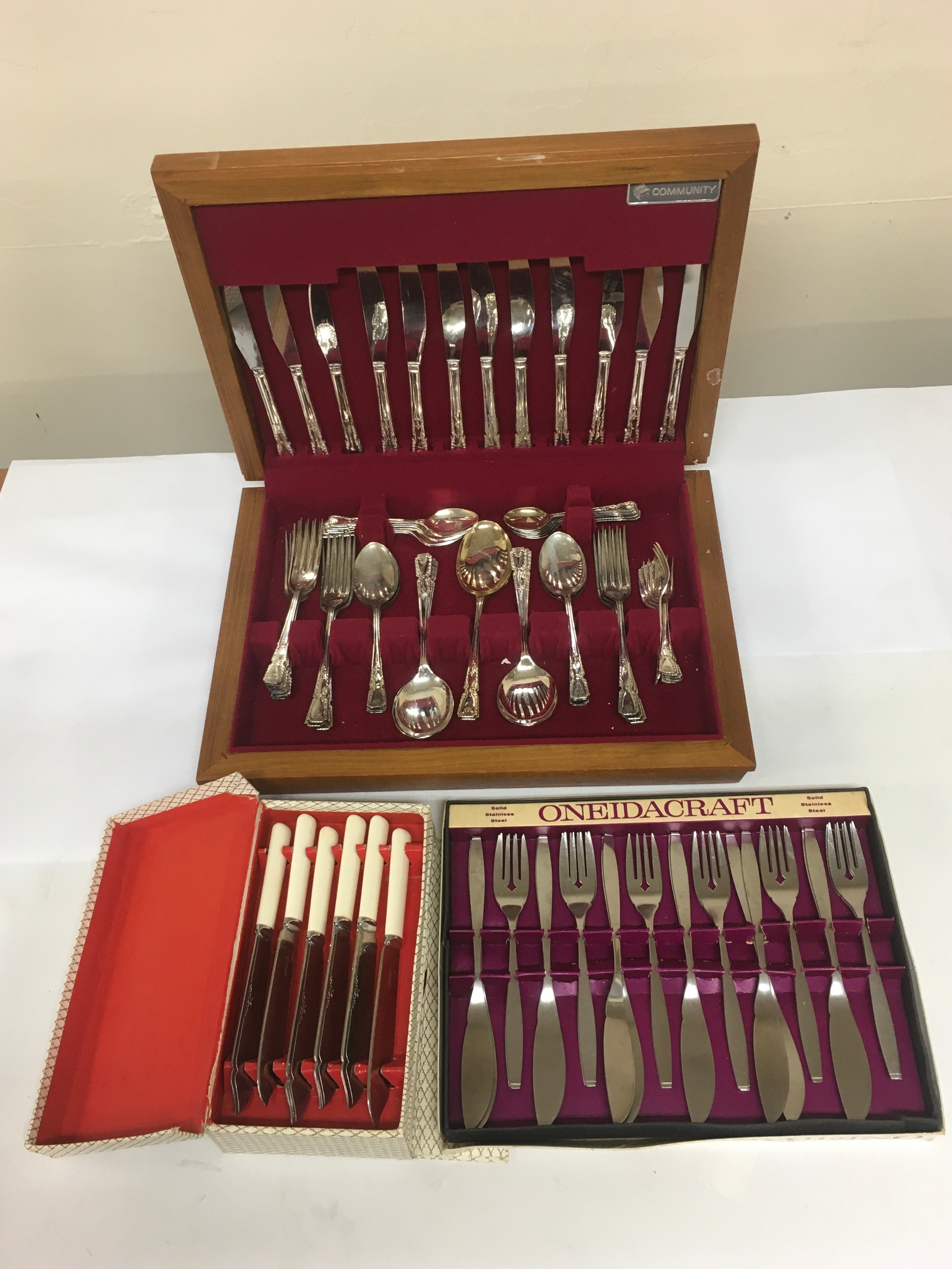 Sets of stainless steel cutlery with Cases/ boxes. 2 are marked stainless Sheffield steel.  NO RESERVE