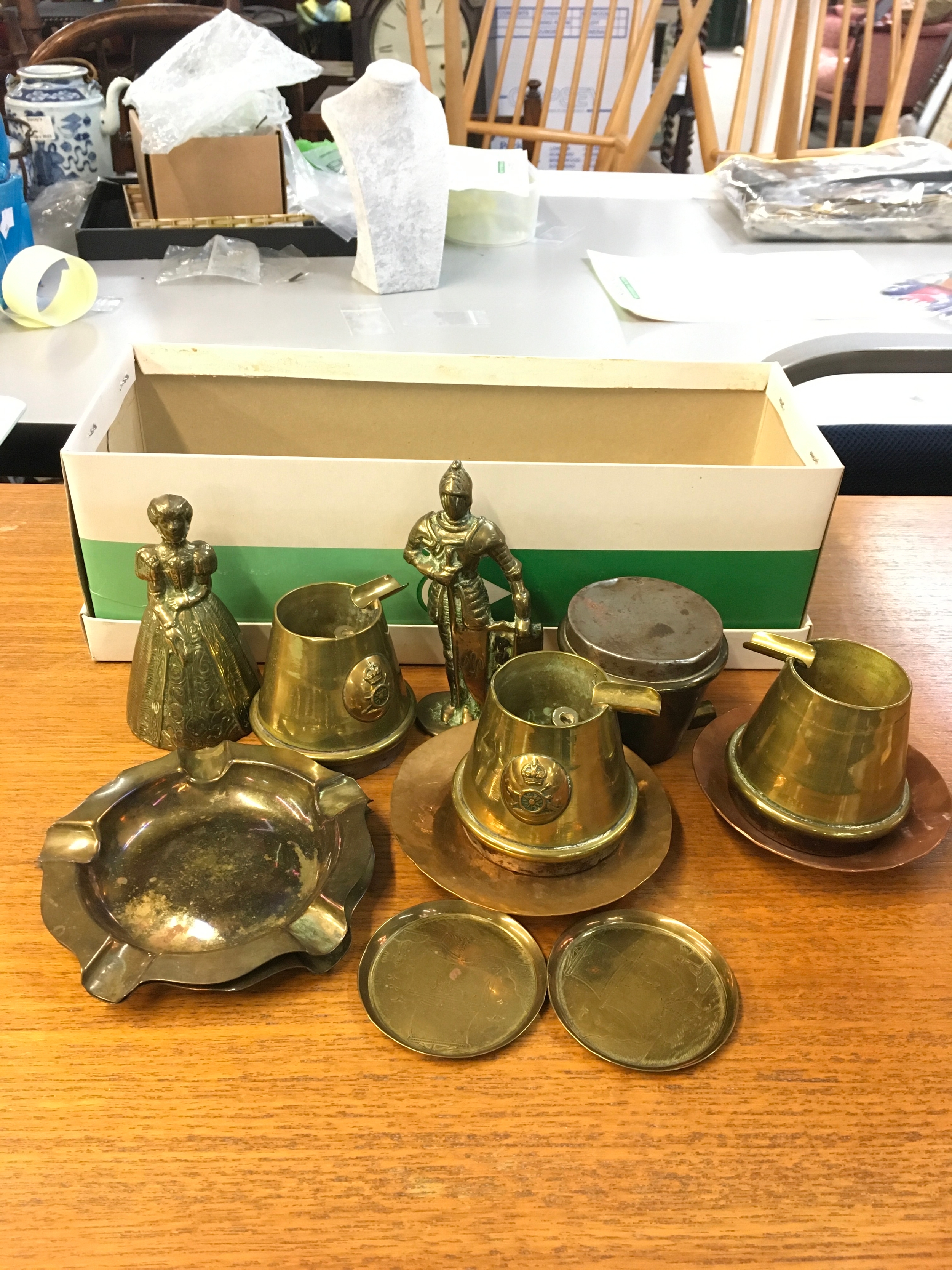 A collection of brass including R.A. Trench art 