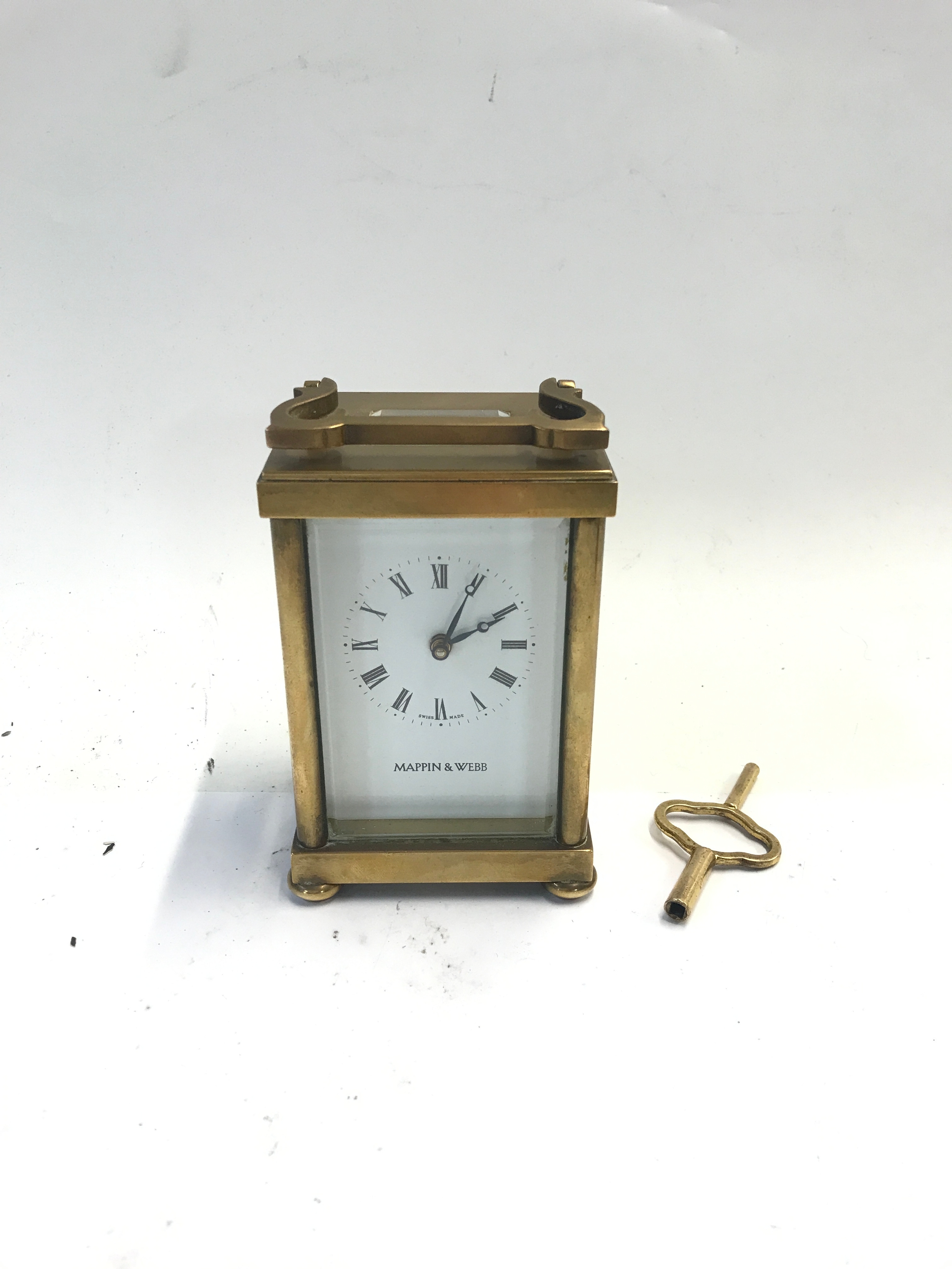 A Mappin and Webb gold plated carriage clock NO RESERVE