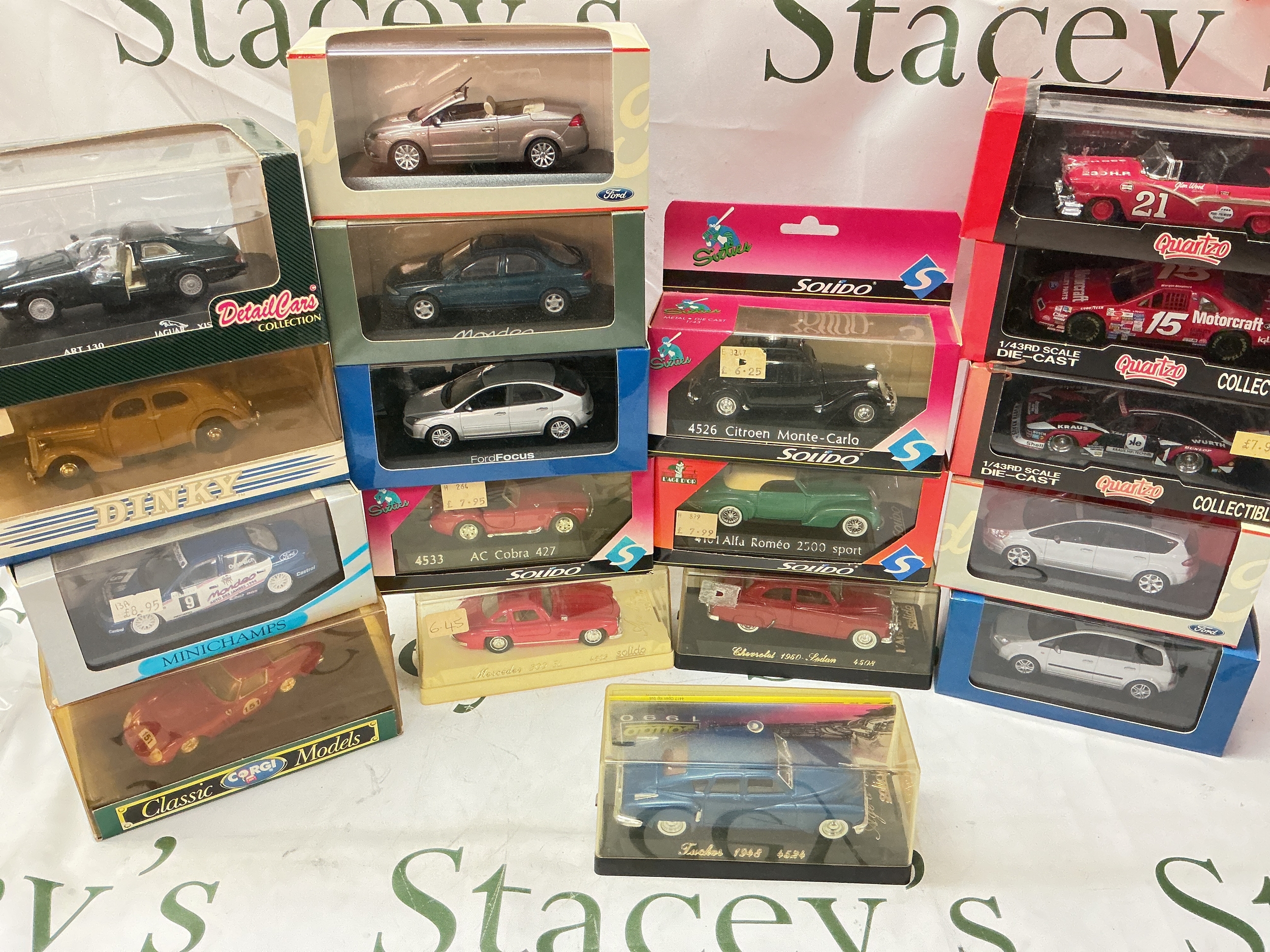 A Collection Of Boxed Diecast Including Minichamps, Corgi, Dinky, Solido,Quartzo Etc. No Reserve.