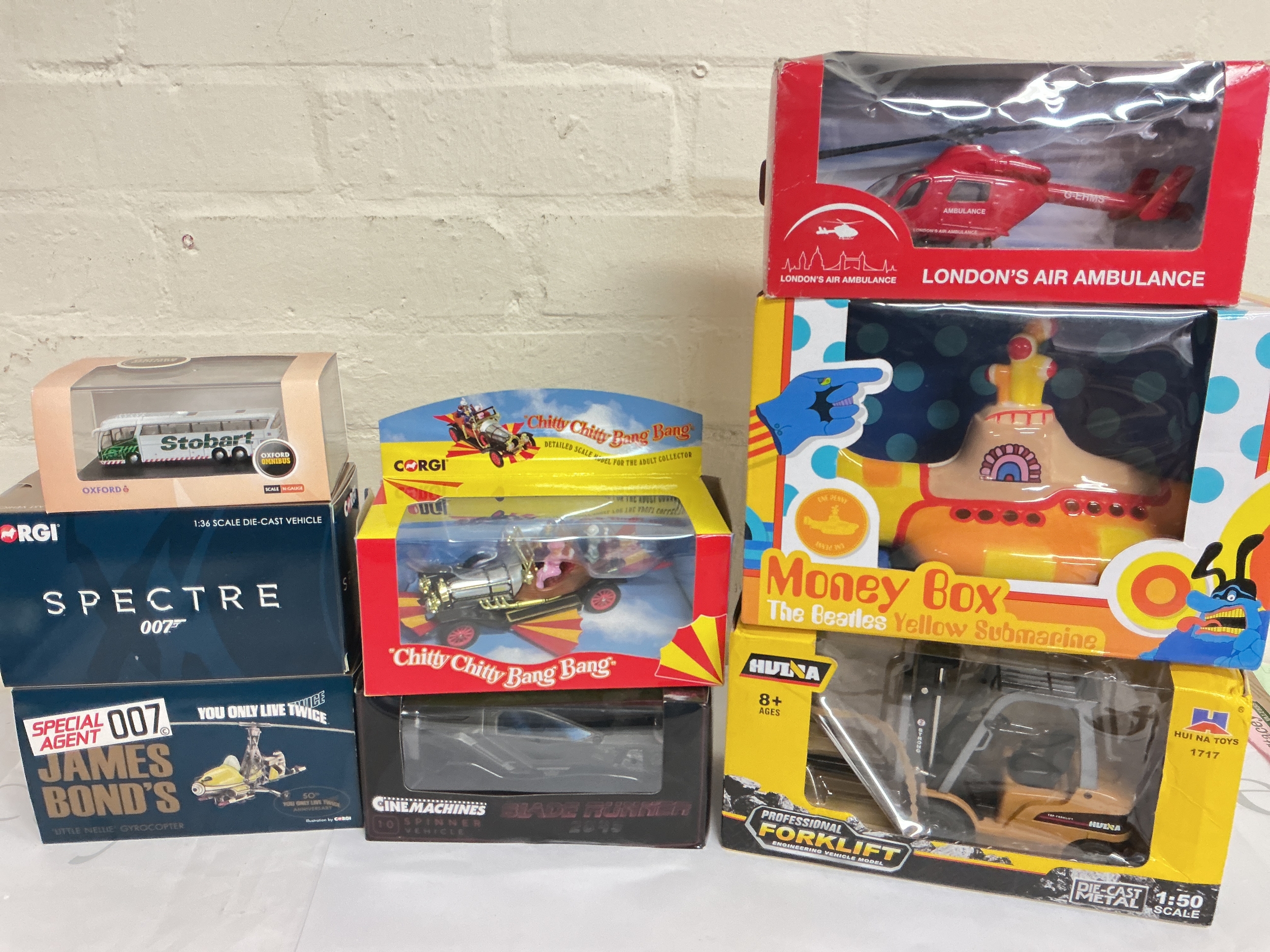 A Collection Of Boxed Diecast Including Corgi, Cine Machines Etc And A Beatles Yellow Submarine Money Box.