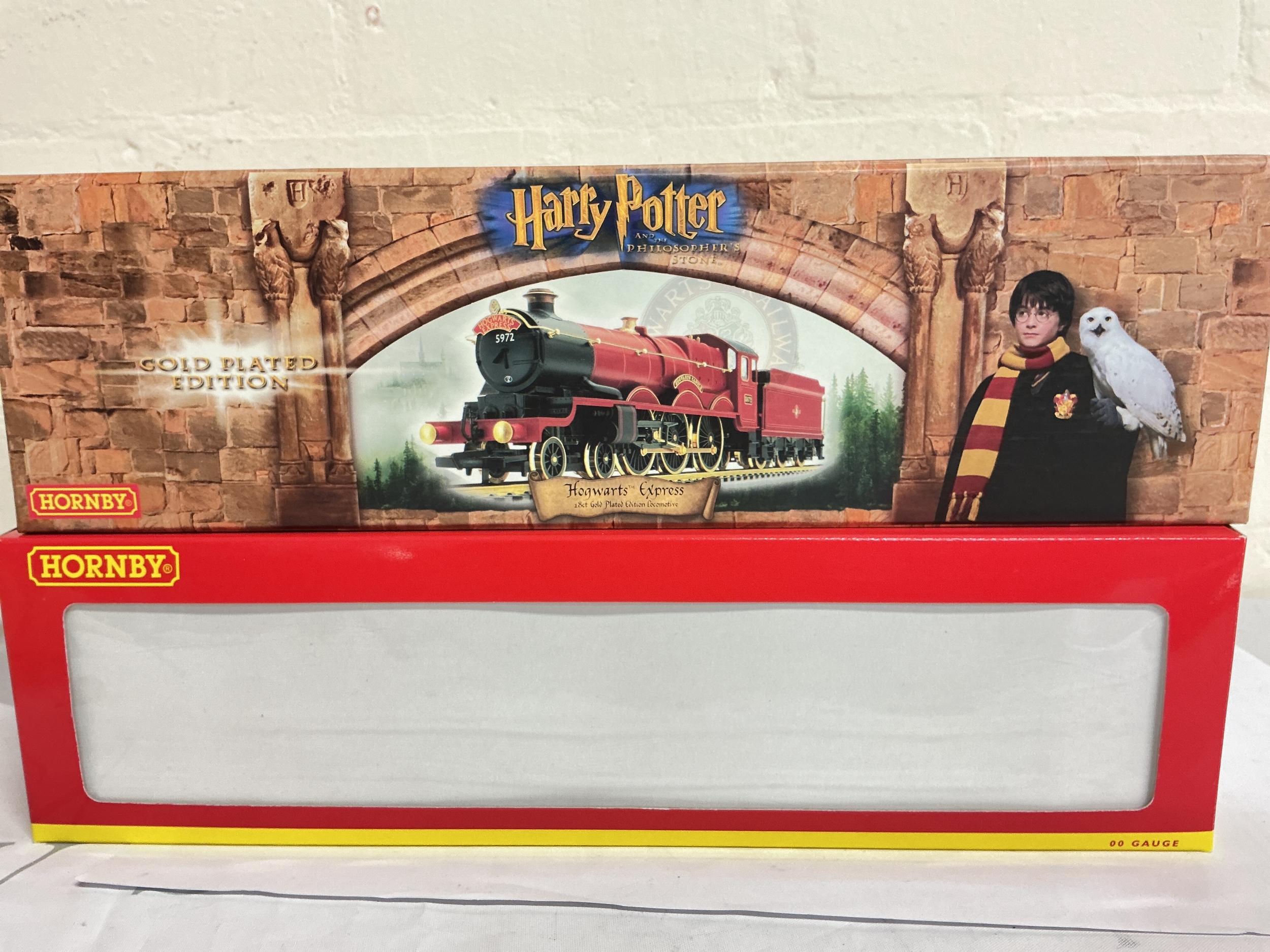 A Boxed Hornby 00 Gauge Harry Potter Gold Plated Hogwarts Express, With Display Box And Shipping Box. No Reserve.