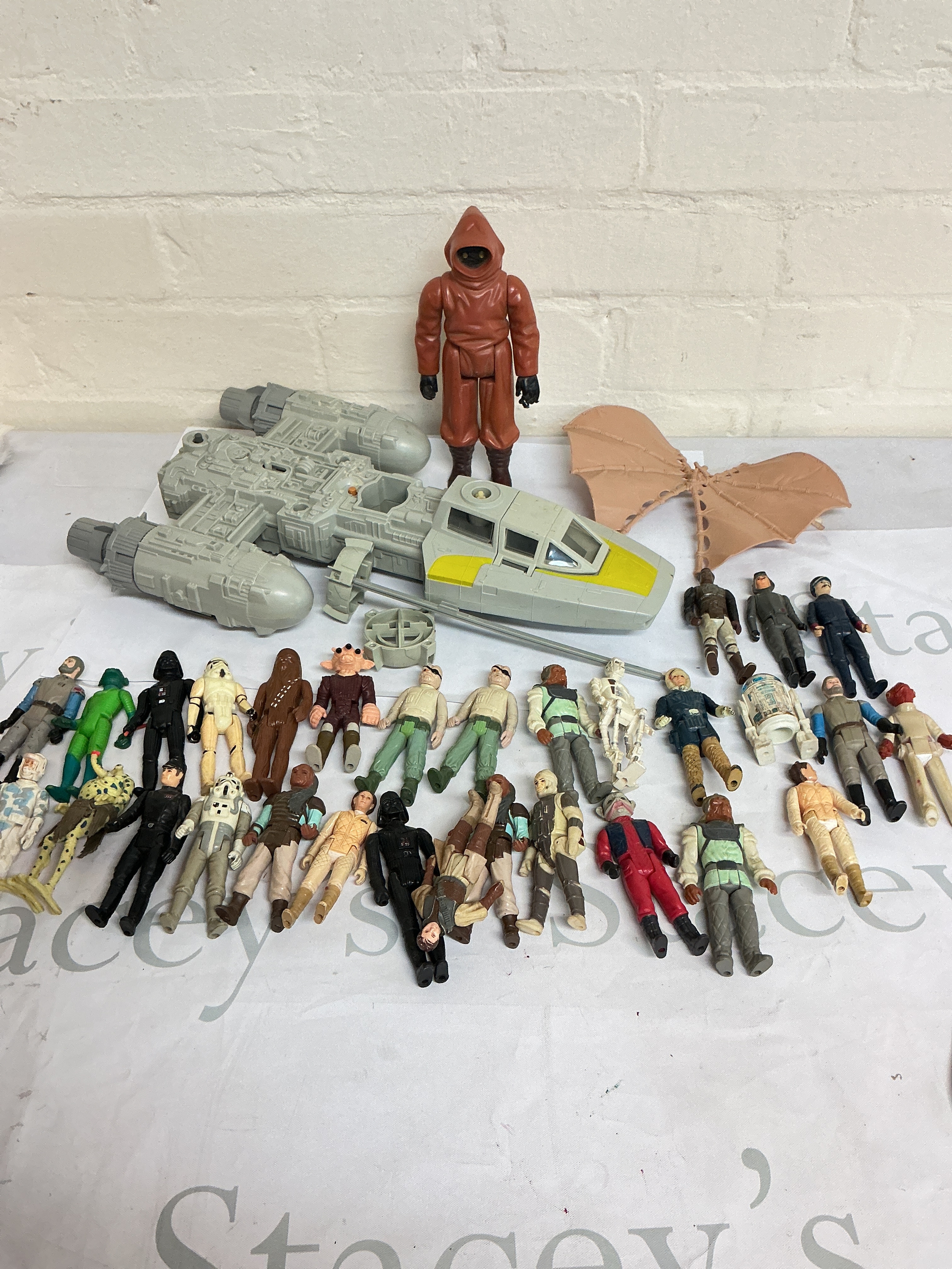 A Collection Of Vintage Star Wars Figures And Accessories.
