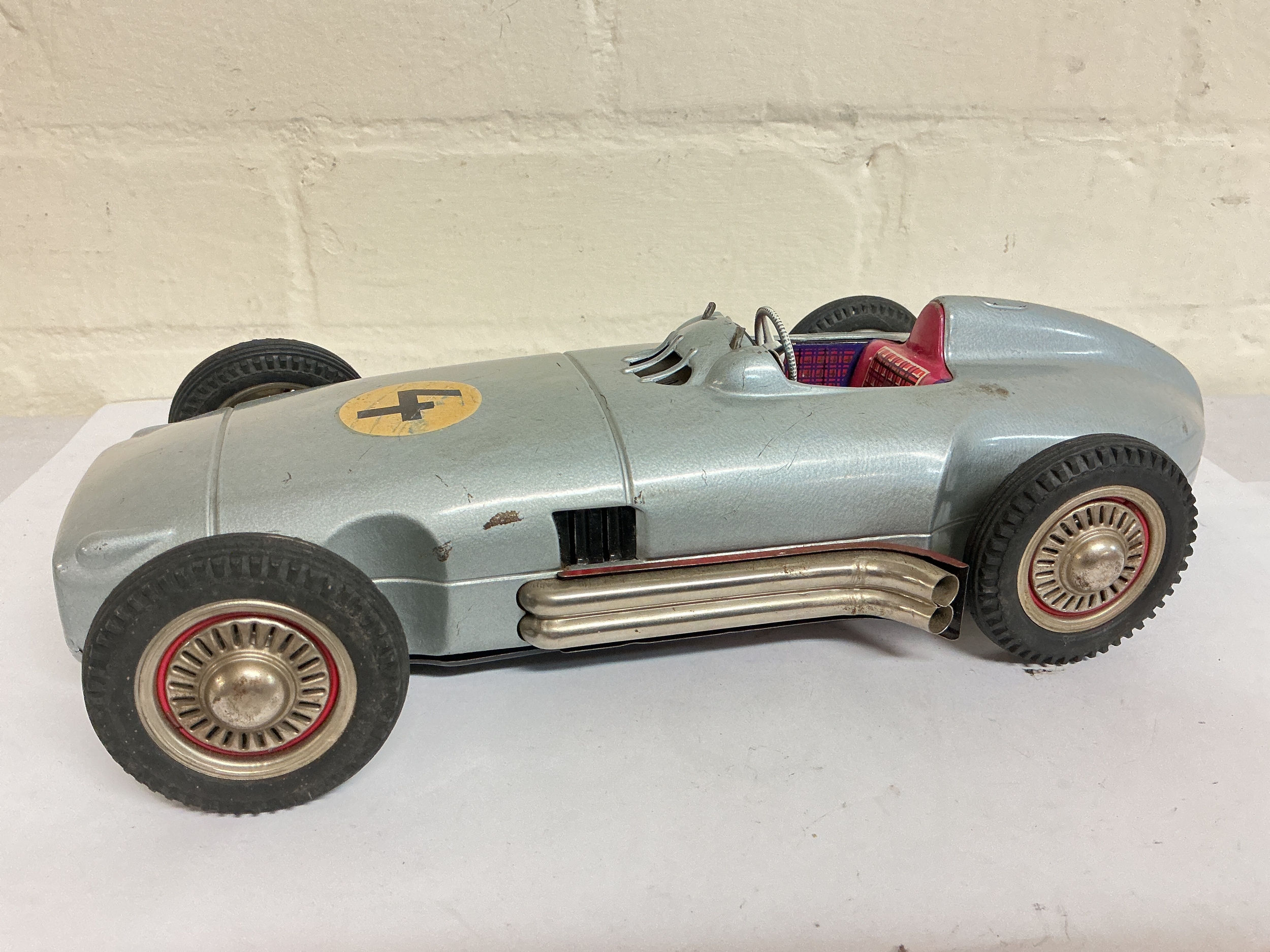 A German JNF Tinplate Mercedes-Benz W196 Silver Arrow Grand Prix Friction Powered Racing Car.