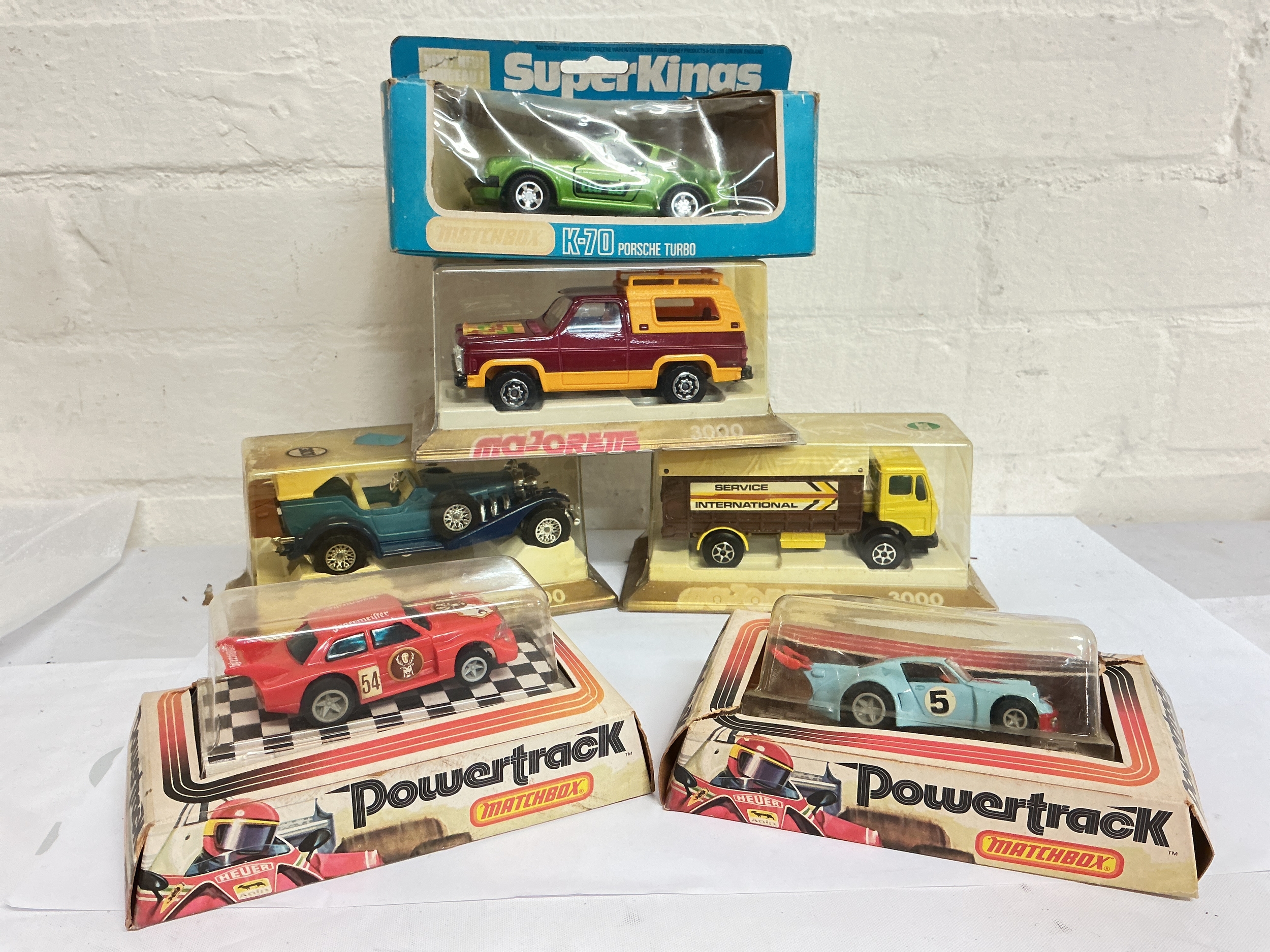 A Collection Of Majorette And Matchbox Diecast And 2 Matchbox Powertrack Cars. No Reserve.