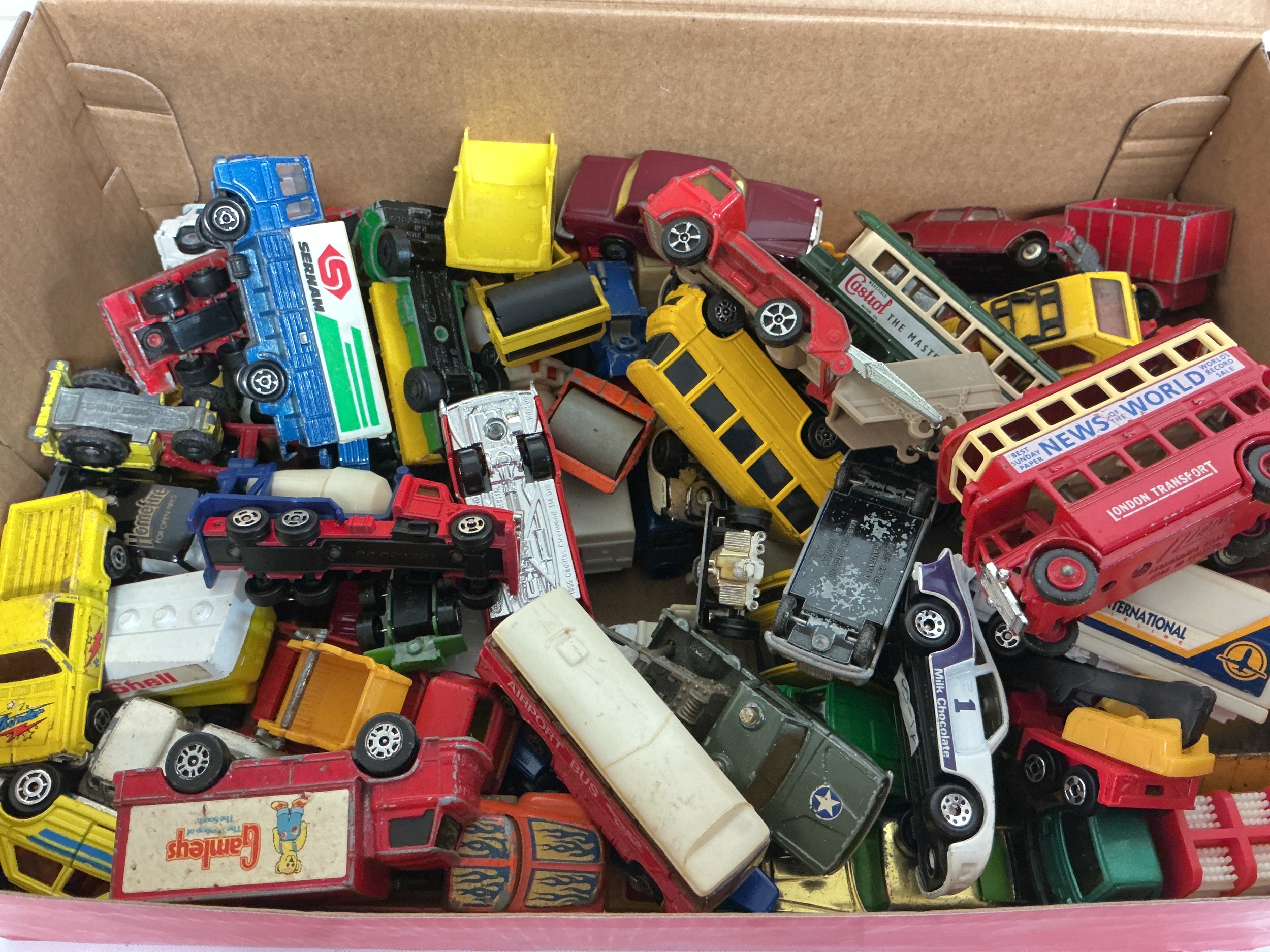 A Box Containing Playworn Diecast Including Matchbox, Corgi, Husky,Majorette, etc. No Reserve.