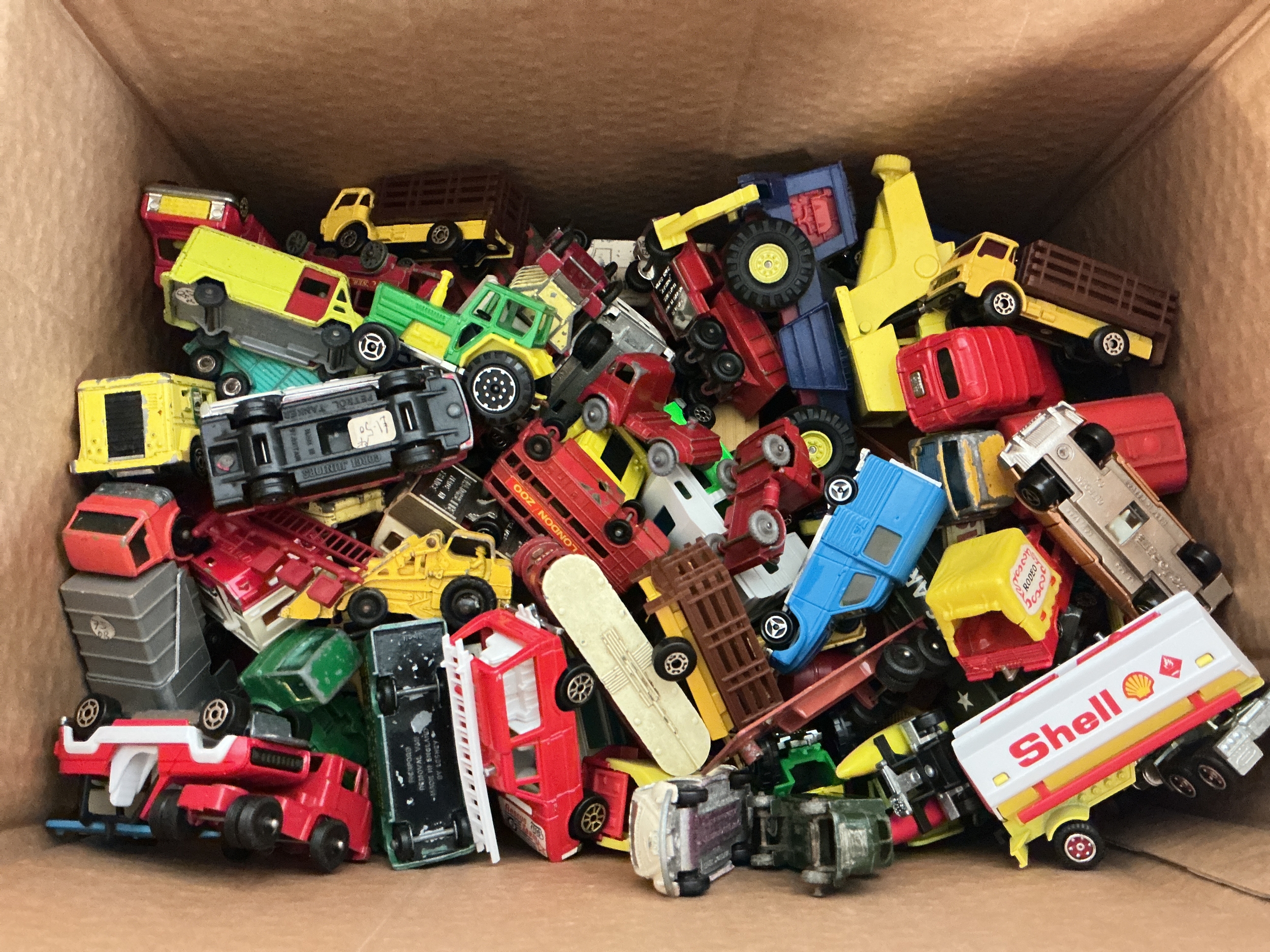 A Box Containing Playworn Diecast Including Matchbox, Majorette Etc. No Reserve.