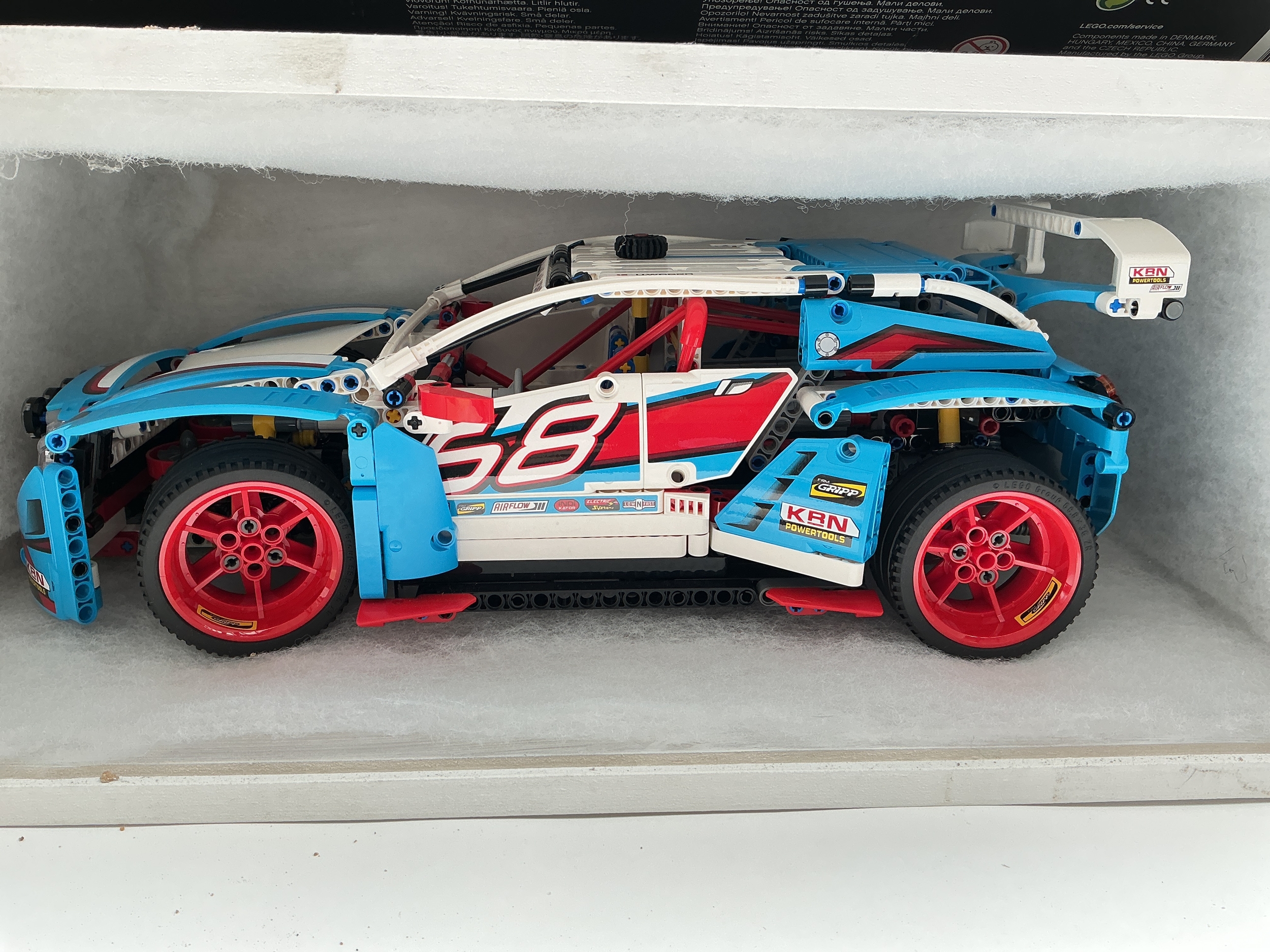 A Lego Technic Rally Car In Display Case With Box And Manual #42077 No Reserve. (2).